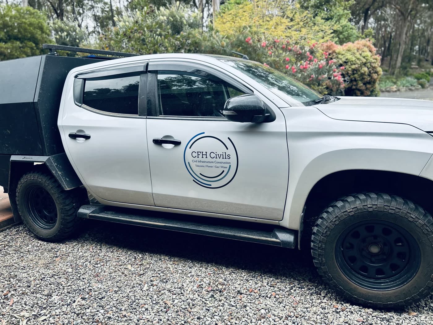 CFH Civils branded utility vehicle with tray-mounted service body